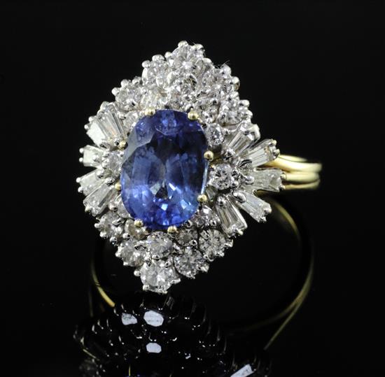A modern 18ct gold, sapphire and diamond cluster ring, size S.